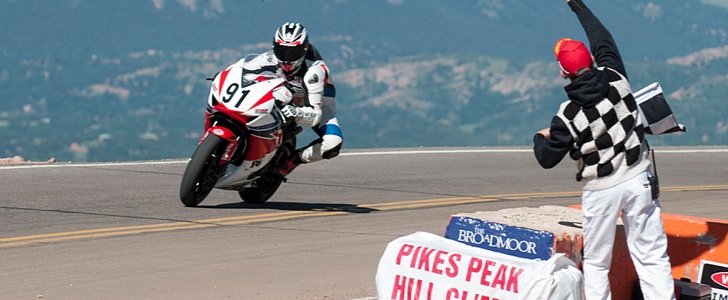 A motorcycle arrives at the PPIHC finish line
