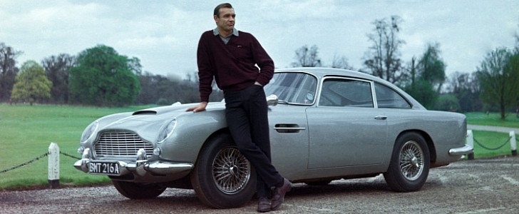 Sean Connery as James Bond, with his Aston Martin DB5