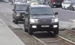 The Russians Have Perfected Driving SUVs on Tram Lines