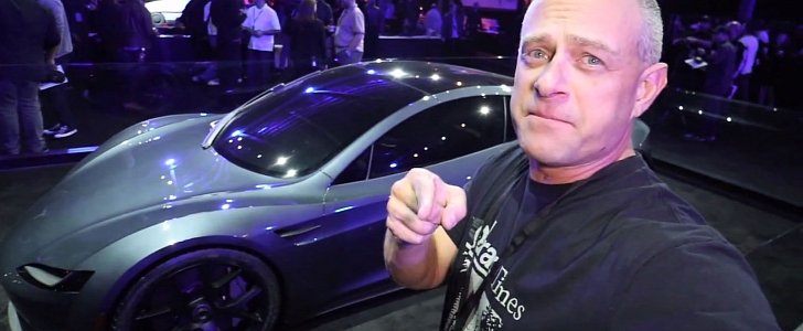 Brooks from DragTimes with a Tesla Roadster prototype