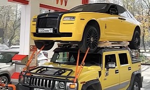 The Things Some People Do for Views: Hummer Caught Carrying a Rolls-Royce on Its Roof
