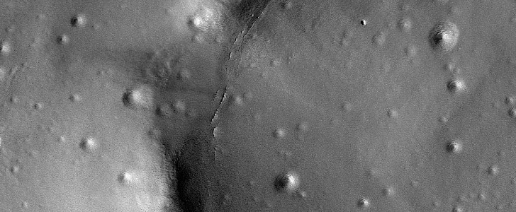 Disappearing crater on Mars' northern lowlands