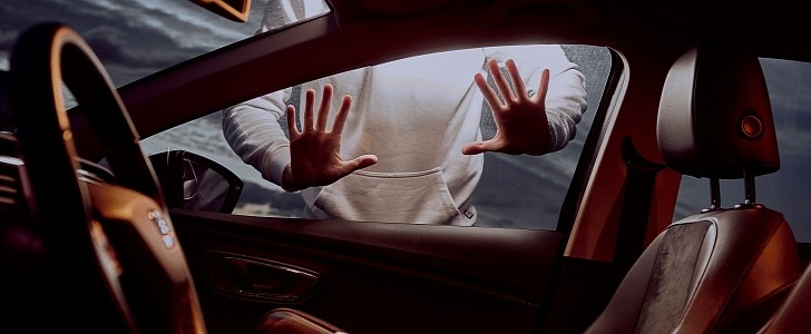 Hands on Car Window