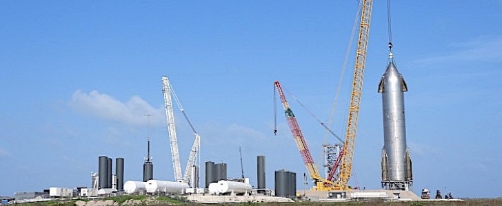 Liebherr crane lifting Starship into position