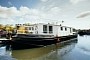 This $1.5 Million Houseboat With a Roof Terrace is Pure Luxury on Water