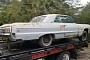This 1964 Chevrolet Impala SS Sleeps Tight on a Trailer, Likely Forgotten for Many Years