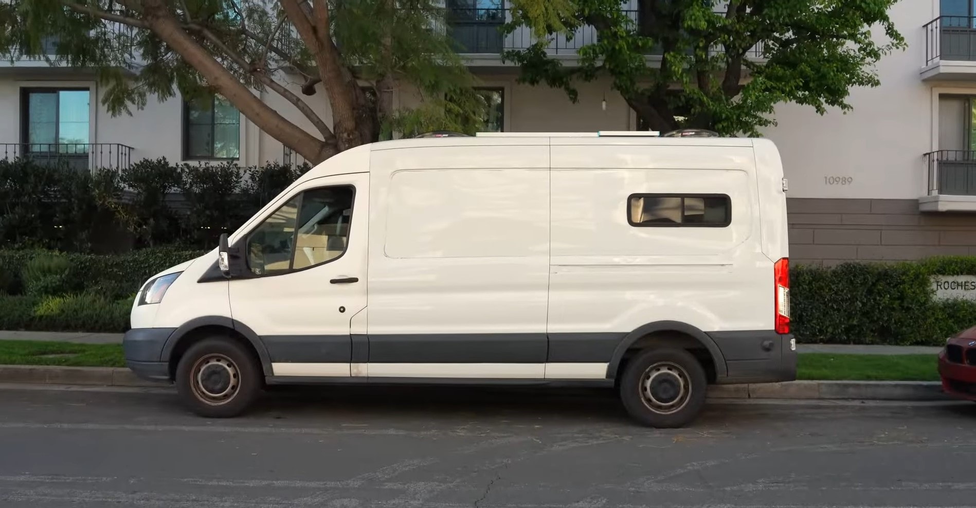 2015 Ford Transit converted into a minimalist dormitory on wheels