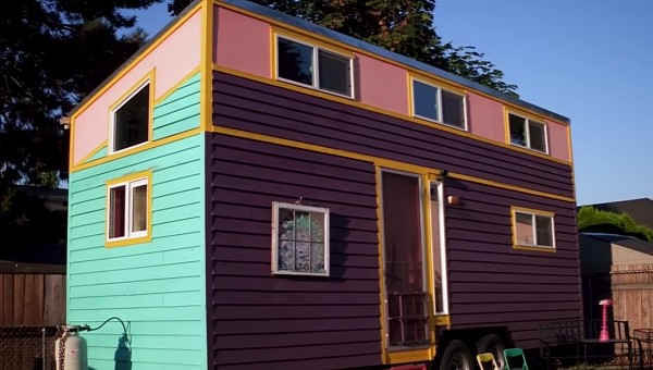 Lovely and Bright colored tiny house on wheels