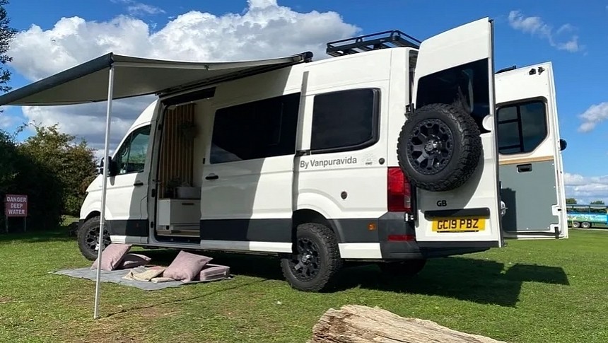 Custom van conversion with L-shaped couch 
