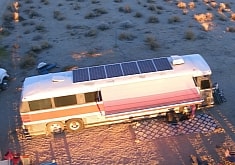 This Bus Turned Tiny Home Features a Luggage Compartment Bedroom and a Pet Snake