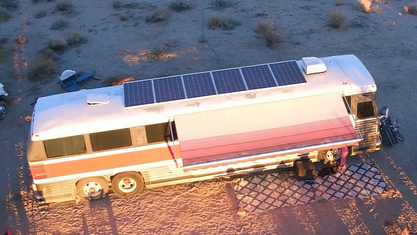 This Bus Turned Tiny Home Boasts a Luggage Compartment Bedroom With a Pet Snake