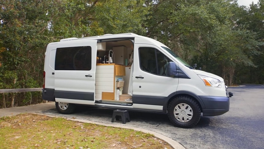 This Pet-Friendly Camper Van Is a Cozy Tiny Home on Wheels With a Hidden Bathroom