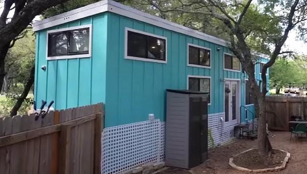 Blue and chic tiny house with two lofts and a full bathroom