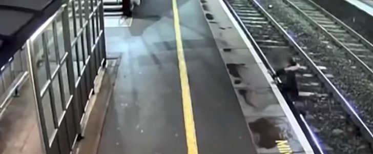 Drunk man stumbles onto train tracks, barely makes it back to safety before train comes