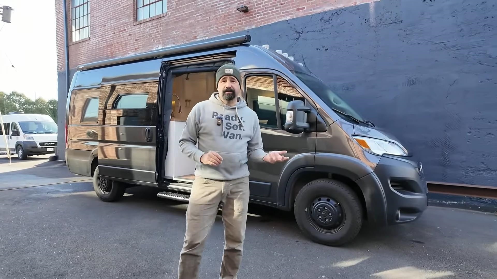 This Cozy Camper Van Is a Fancy Hotel Room on Wheels With a Hidden Bedroom
