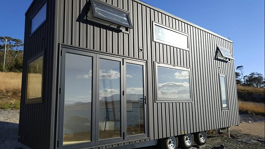 This custom version of the Sowelo Tiny House was designed to be fully off-grid