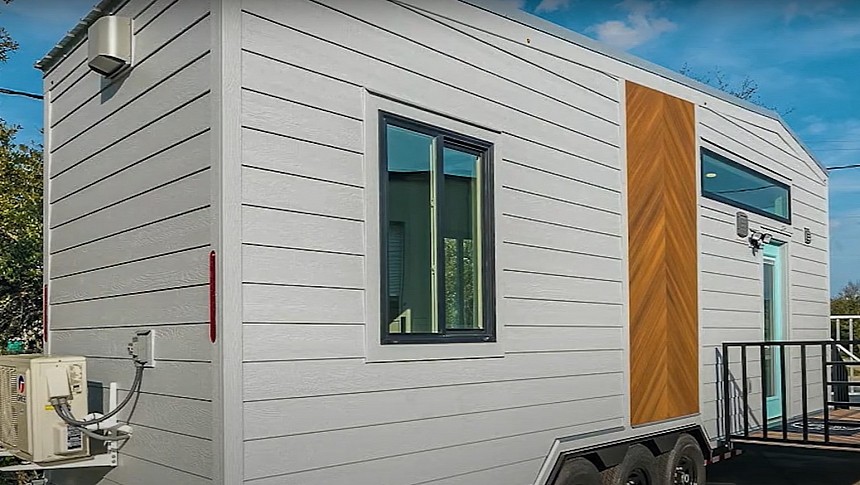 The Lindstrom is a beautiful tiny house with a main-floor bedroom and a loft bedroom