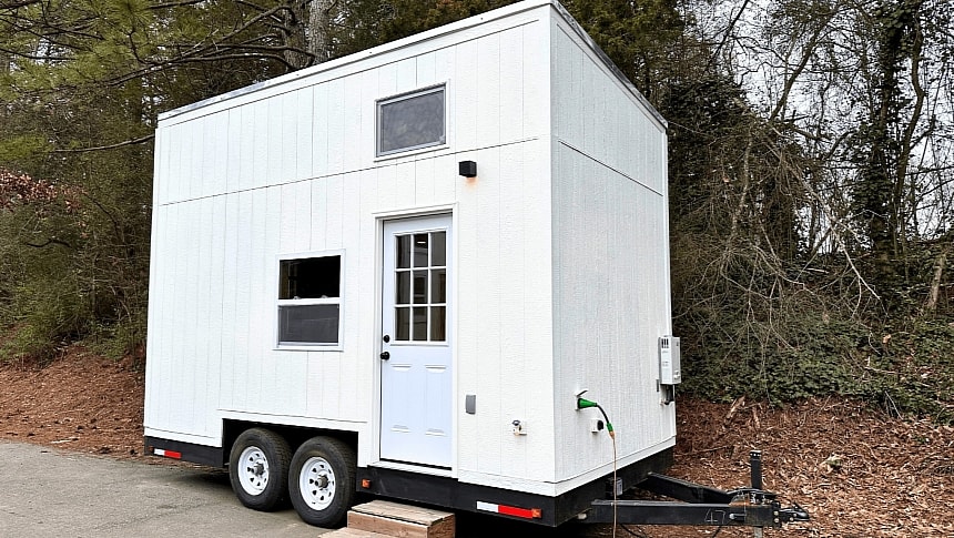 This 16-foot tiny comes with one loft bedroom and a classic layout