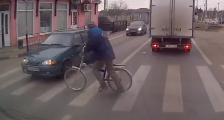 Kid Running with his bike into a car