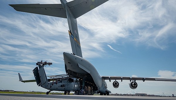HH-60G Pave Hawk being loaded into a C-17 Globemaster in preparation for Hurricane Ian