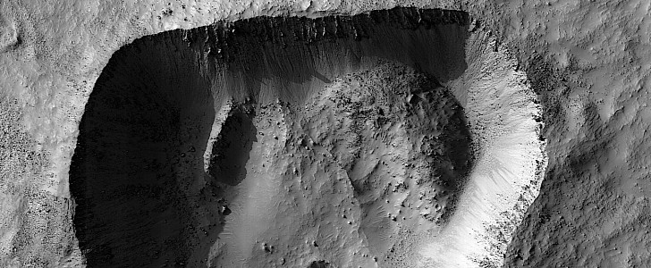 Strangely shaped crater in the Noachis Terra region of Mars