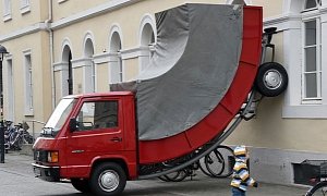 This Leaning Red Mercedes MB100D Truck Artwork Got a Parking Ticket