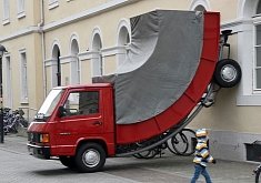 This Leaning Red Mercedes MB100D Truck Artwork Got a Parking Ticket