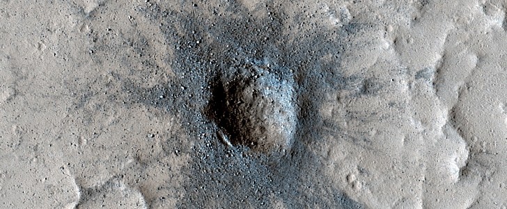 This crater on Mars was repeatedly snapped on film
