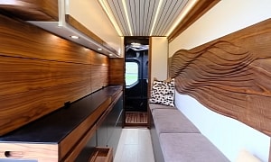 This Masterpiece on Wheels Features a Stunning Walnut Interior Packed With Hidden Features
