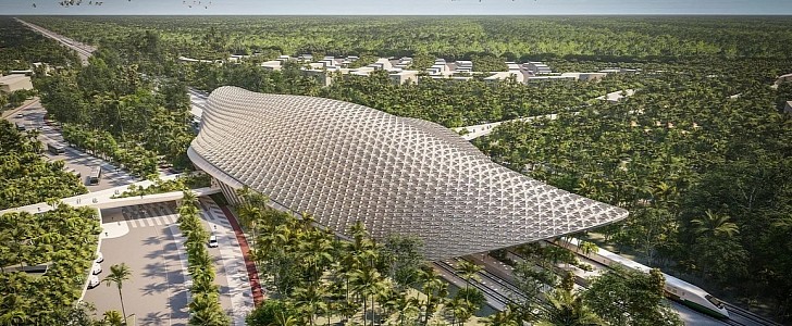 The Tulum train station has a large, lattice roof with a Mayan-inspired geometry