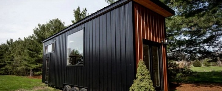 Tiny home with black exterior reveals a light-filled, modern interior
