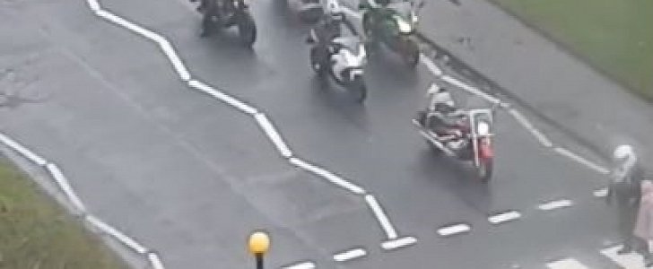 Bikers stop at zebra crossing to help old lady cross the street