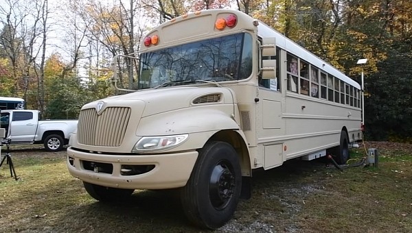 School bus transformed into a motorhome for a single woman