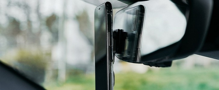 The hook allows you to put the phone anywhere in your car