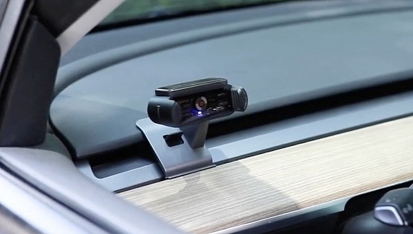 The phone holder was built with Tesla in mind