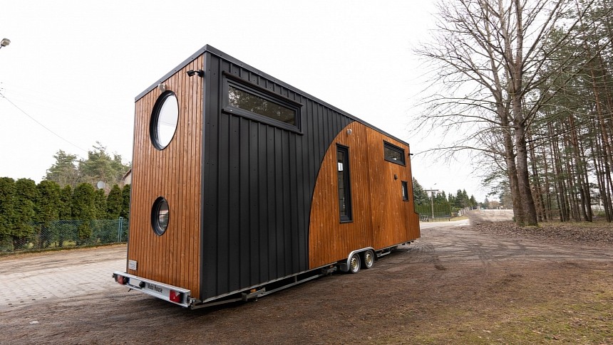 The Melon tiny house features beautiful windows of different sizes and shapes