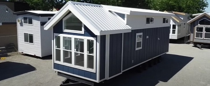 Amazing tiny home with double loft has enough space for a growing family