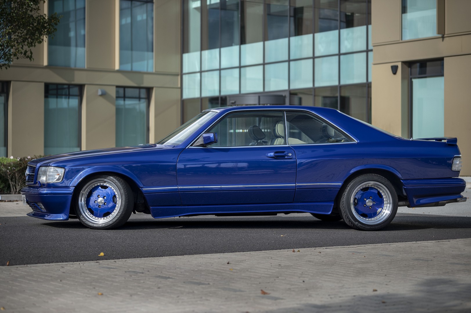 This Very Blue And Wide 1987 Mercedes Benz 560sec Amg Sold For Just Under k Autoevolution