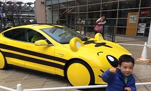 This Yellow Tiger Tesla Model S Spotted in Japan, Complete with Tail and Ears