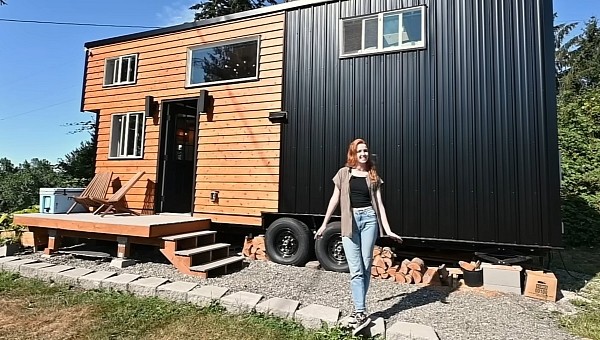Tiny house with two lofts and a deck