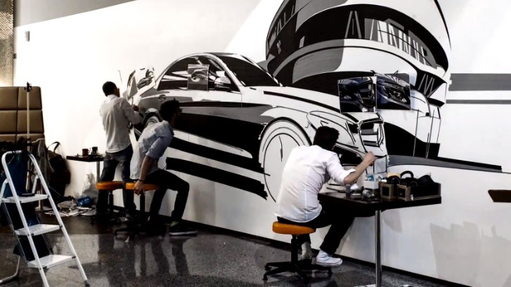 Three Men “Painting” the New C-Class with Tape Is Cool