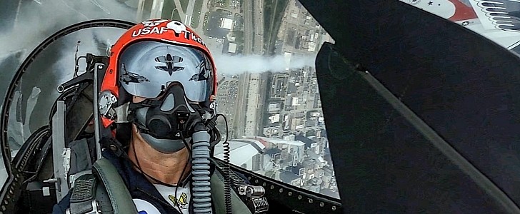 Thunderbirds Maj. Michael Brewer flying over the Cleveland Browns stadium