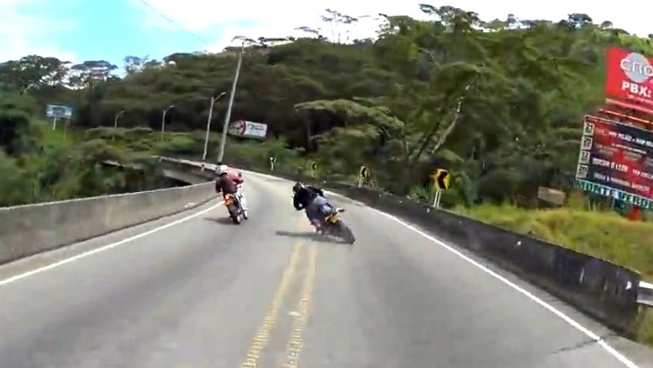 Rider crashing because of having poorly chosen his line through a turn