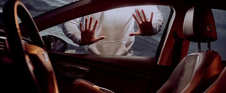 Hands on car window