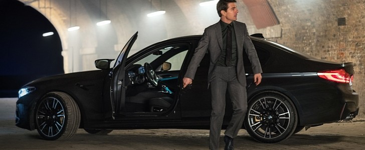 Tom Cruise as Ethan Hunt and his longtime partner in the franchise, BMW
