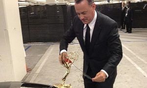 Tom Hanks Tapes Emmy Award to Hood of a Lincoln