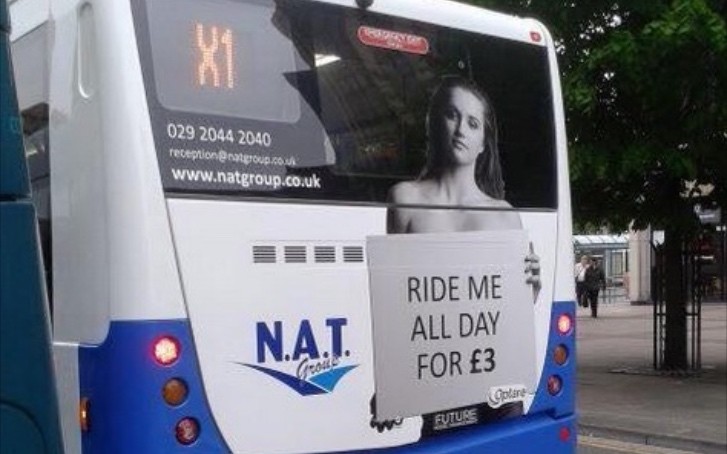 Topless Men and Women Holding “Ride Me All Day for £3” Signs Appear on Busses in the UK