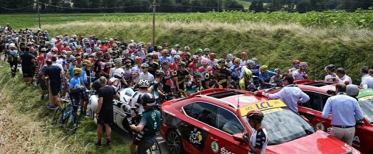 Tour de France 2018 comes to a halt after police clash with protesters and riders are accidentally hit with tear gas