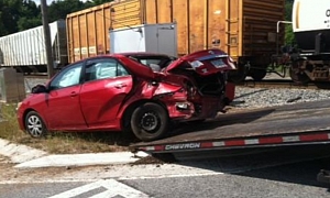 Toyota Corolla Driver Barely Scratched After Train Collision