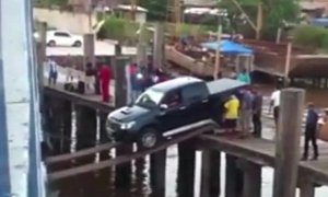 Toyota Hilux Is So Tough It Boards a Ship Using a Pair of Slim Planks